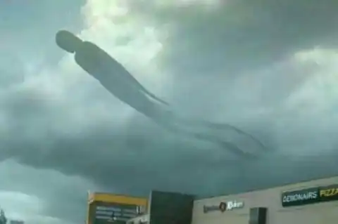 Panic As 'Mystery Human Figure' Appears Above a Shopping Center in the Sky (Photos)
